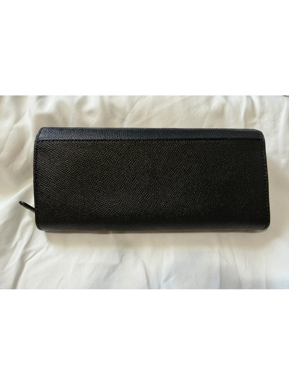 Coach Navy Leather Wallet with Multiple Card Slots and Zippered Compartments